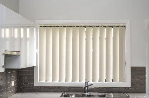 Vertical blinds in kitchen